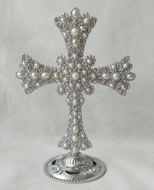 Tall stand  Pearl and stone encrusted cross .